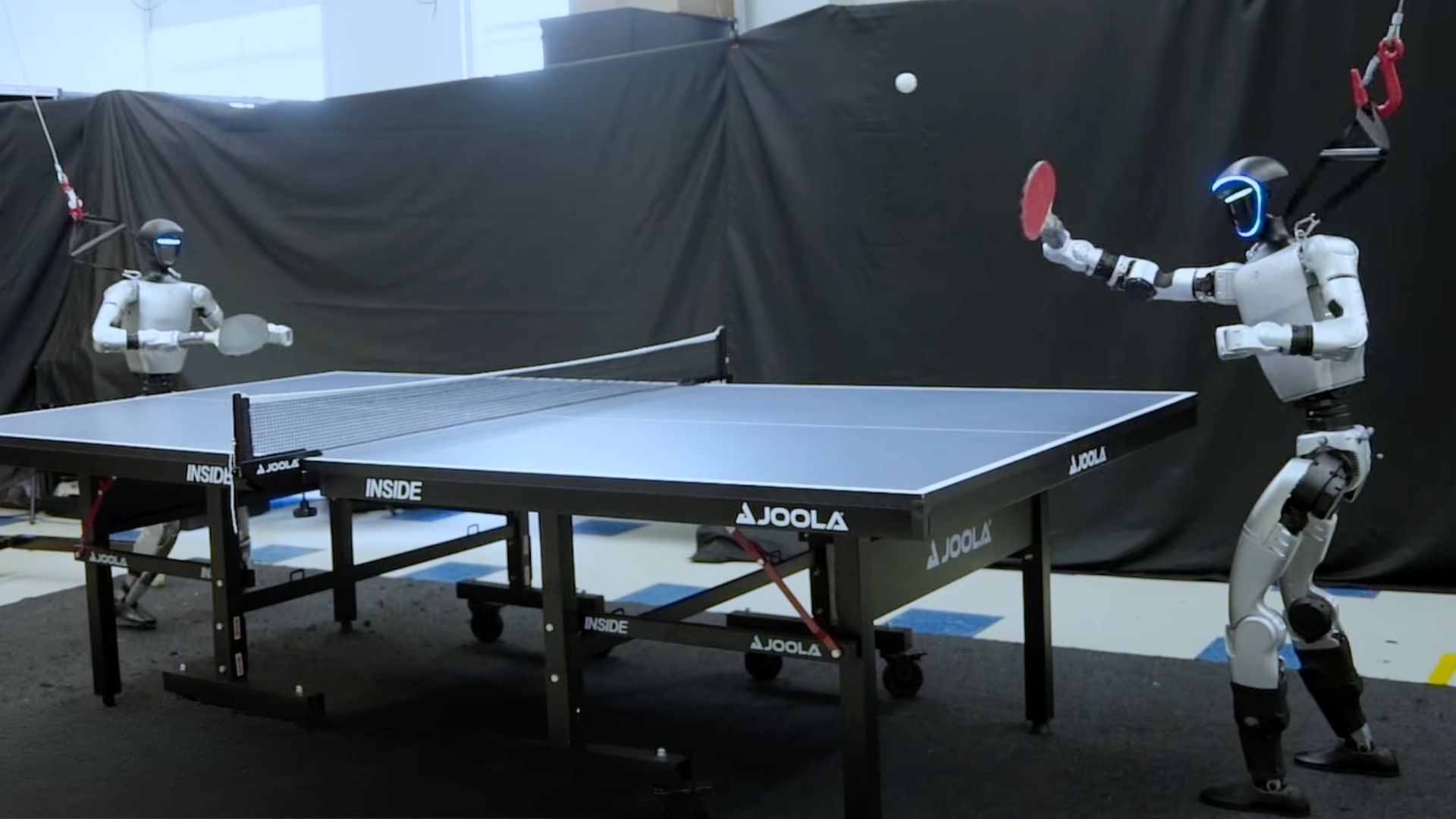 Humanoid robot HITTER plays table tennis with human-like speed