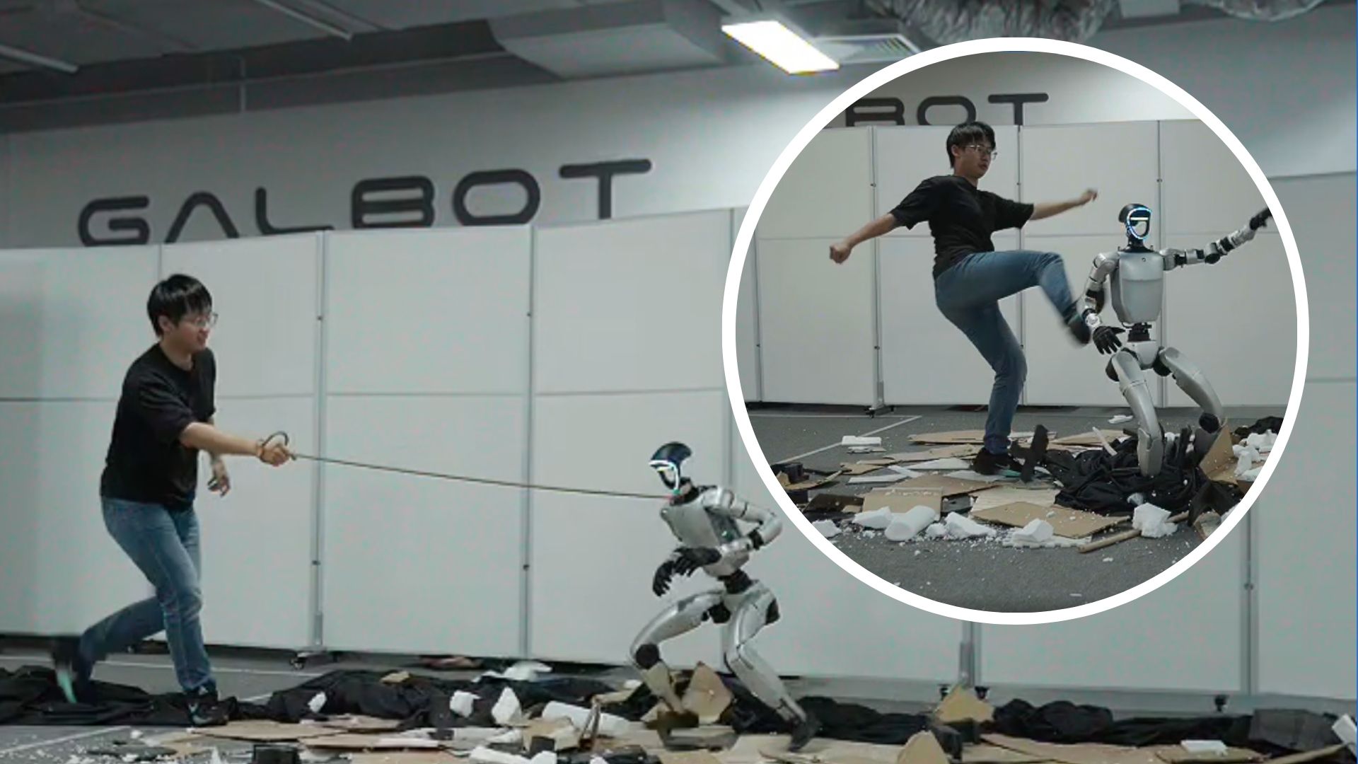 Engineer kicks humanoid robot, yanks it by neck to test stability