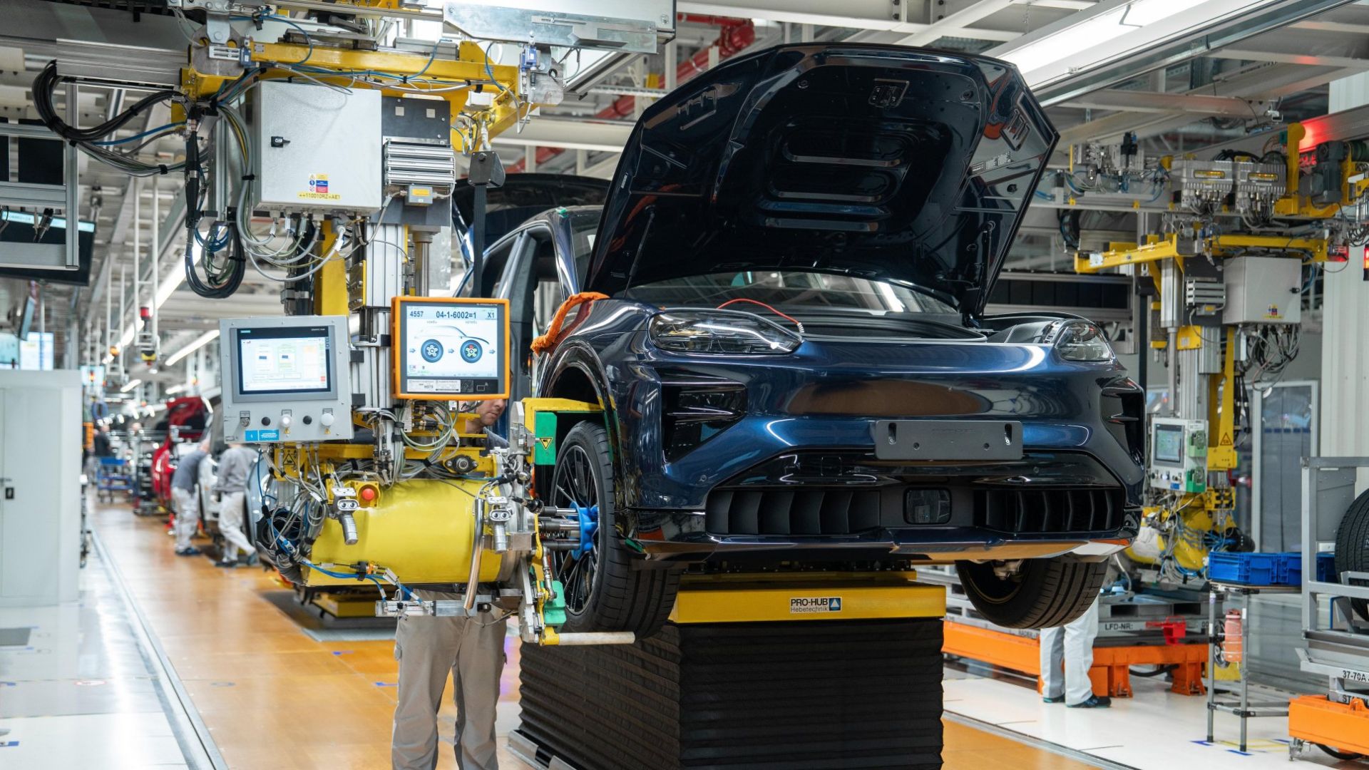 Photos: Porsche begins building new electric Cayenne SUV with in-house batteries