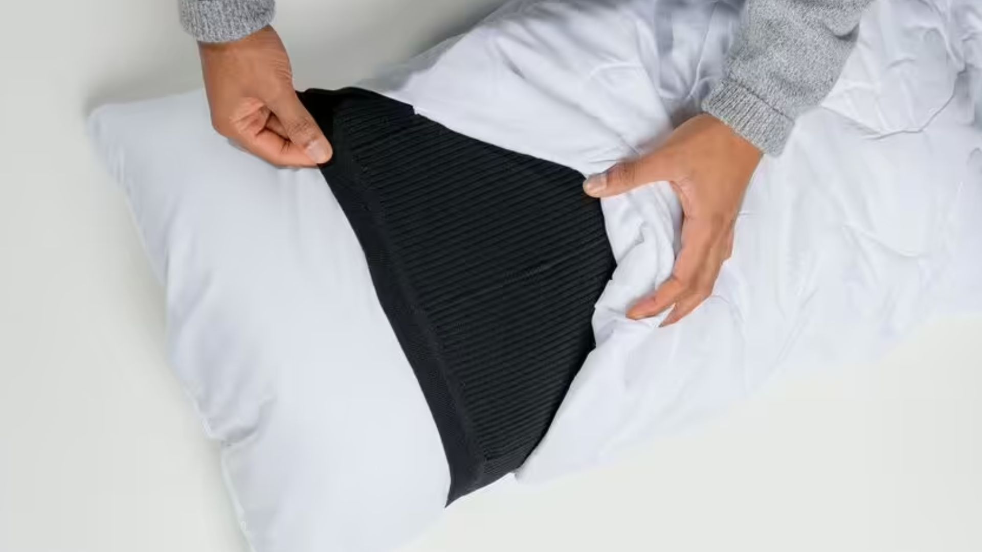 Smart pillow alerts deaf users to fire and burglar alarms at night