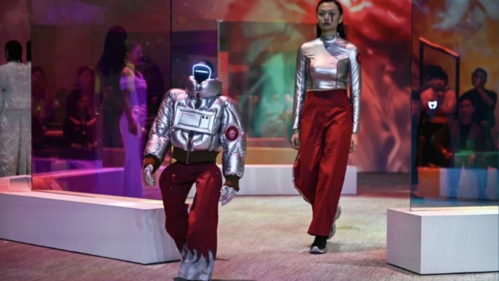 Humanoid robots join human models in rampwalk at futuristic Seoul fashion show