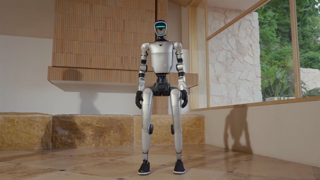 Tokyo summit wows audience with humanoids and robotic hands that can thread a needle