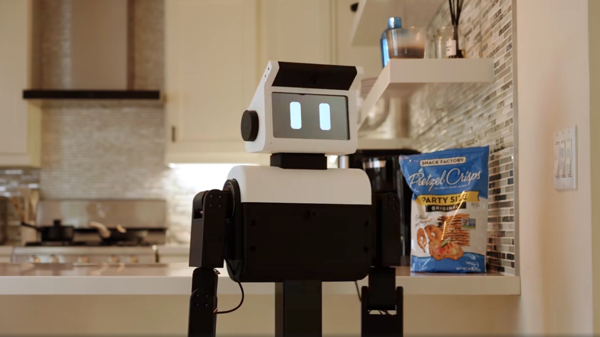 Photograph accompanying A $1,688 home humanoid ships this fall. Read the payload spec, not the price tag.