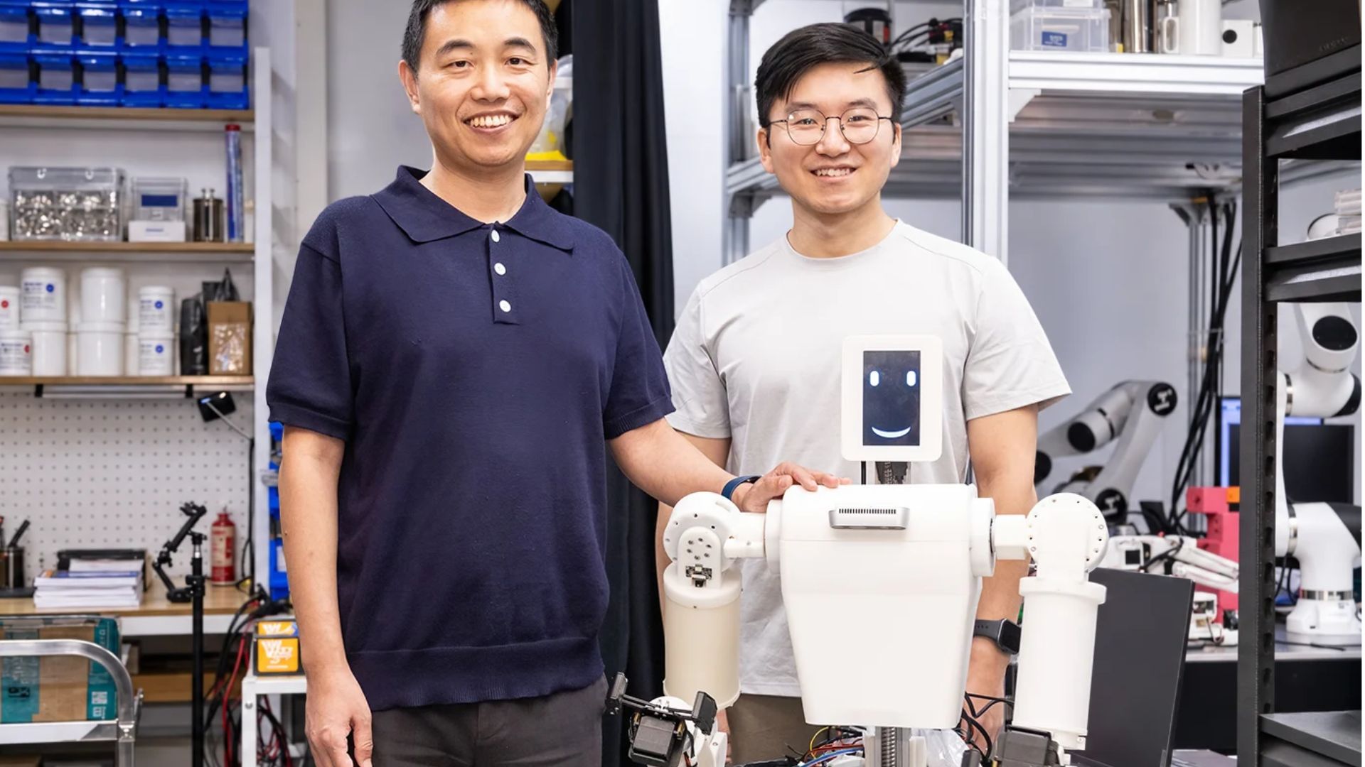 The robotic arm integrates tactile sensing across its entire structure with precise movement control.